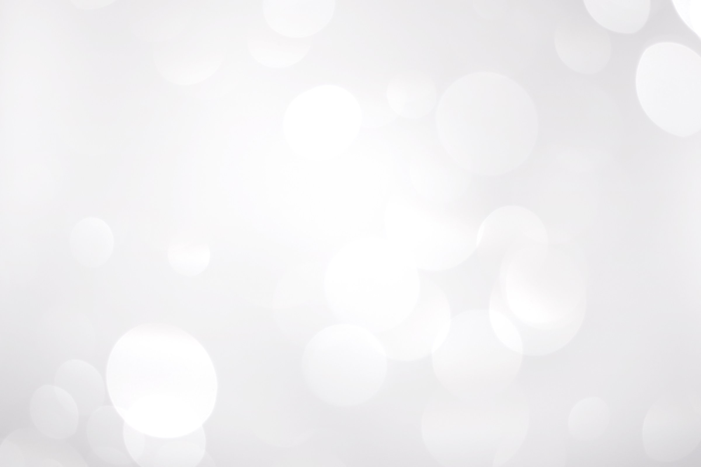  White Snowflakes in  Bright Bokeh Background